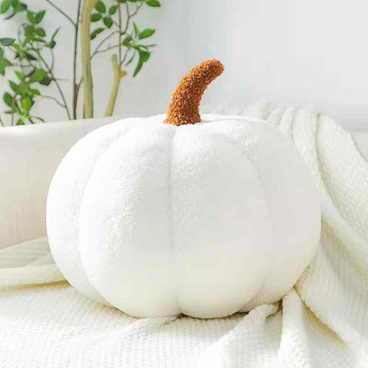 Coussin Citrouille blanc sur un canapé de maison