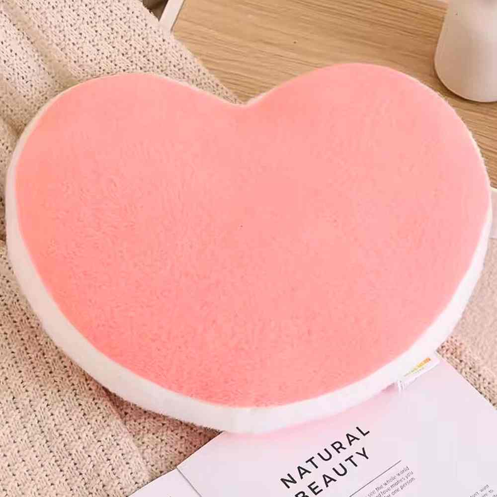Coussin Coeur Rose dans une maison