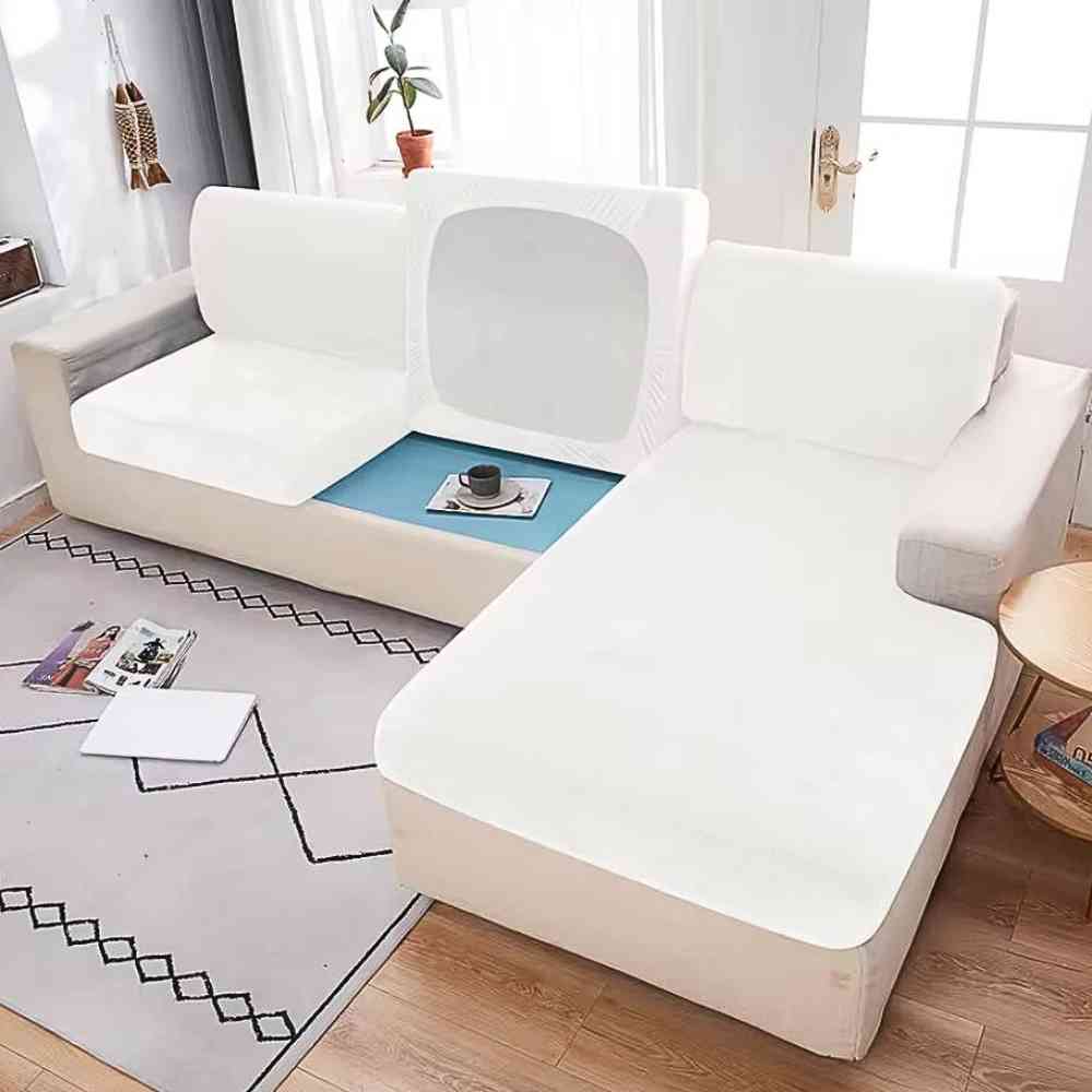 Housse Canapé d'Angle blanche dans un beau salon