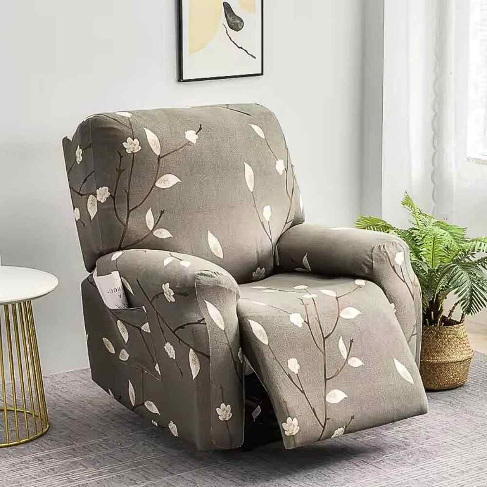 Housse Fauteuil Relaxant Fleuri grise au milieu d'un salon